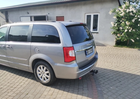 Chrysler Town &amp; Country cena 54500 przebieg: 160000, rok produkcji 2013 z Tuliszków małe 232